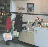 Shoppers refresh with a smoothie from Orange Julius Quick Service Franchise Chain